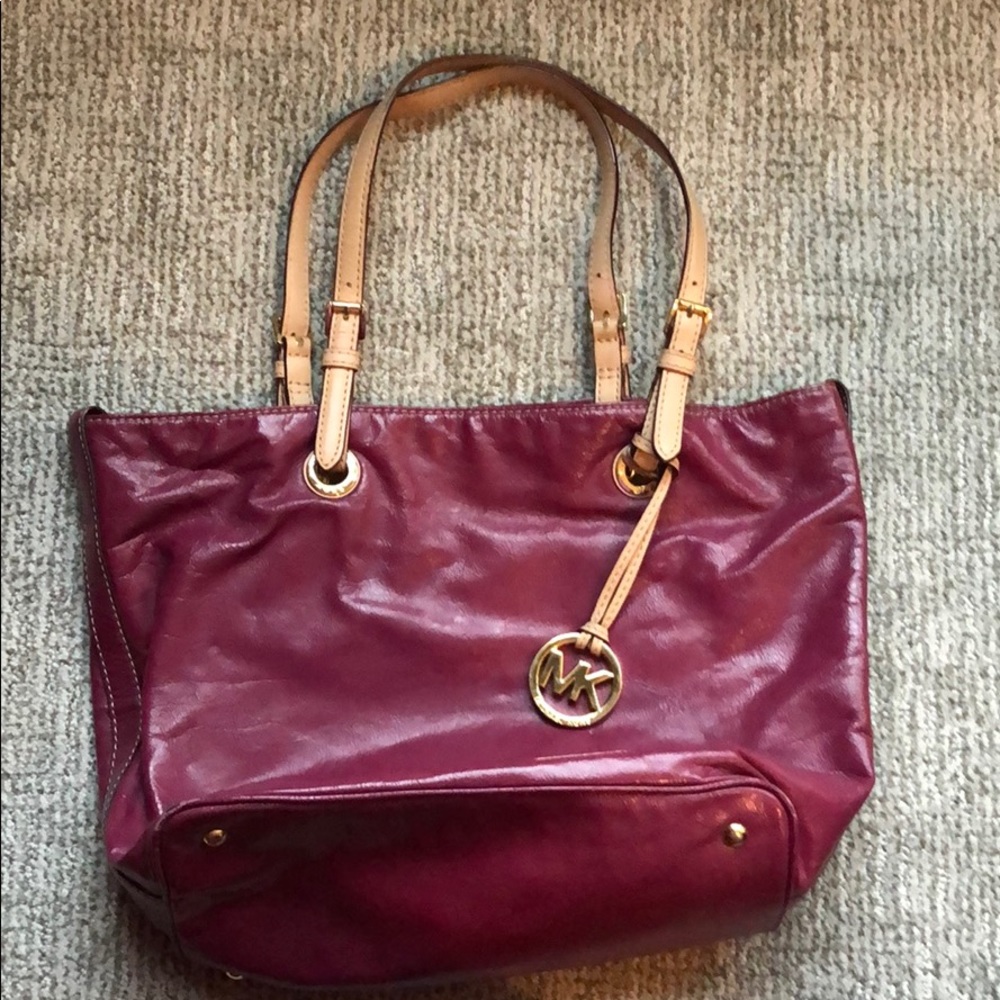Authentic Michael Kors dark pink leather bag